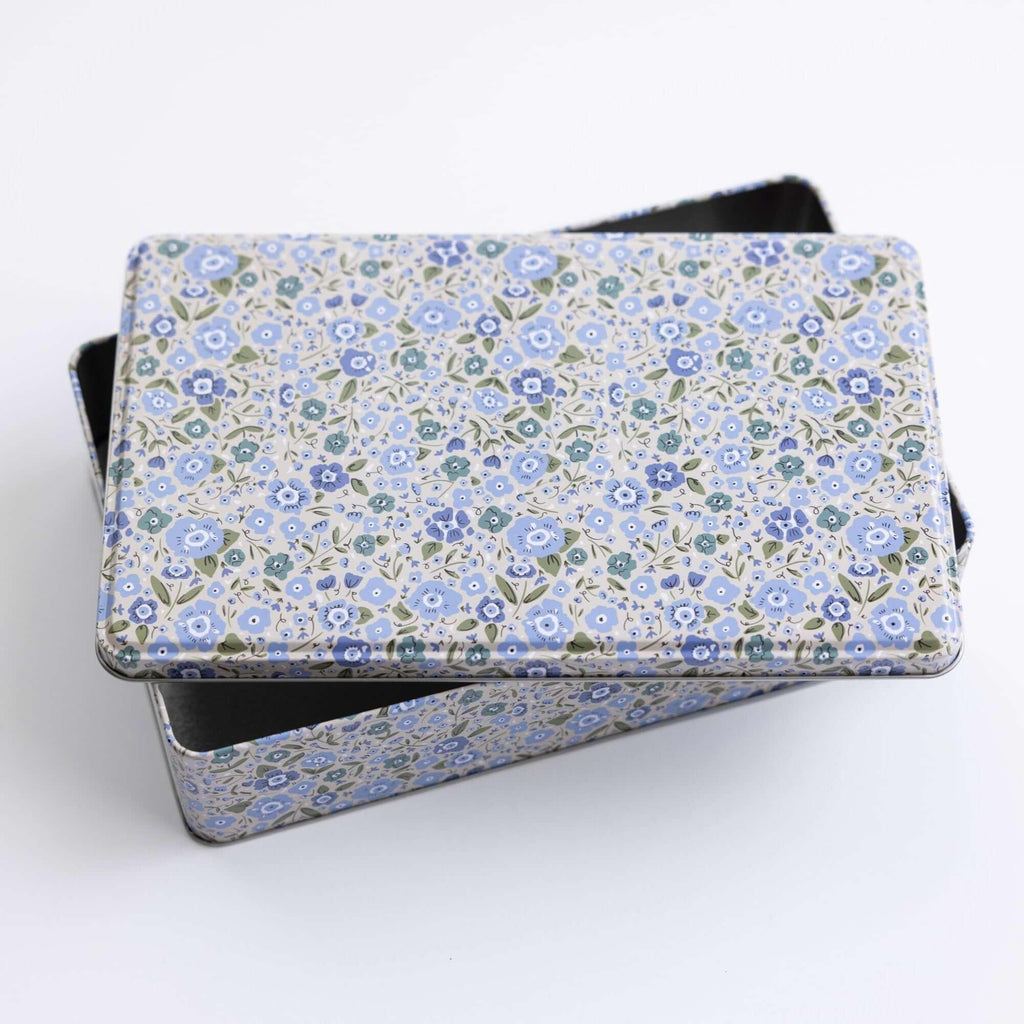 tea towel with illustrated bees and floral elements