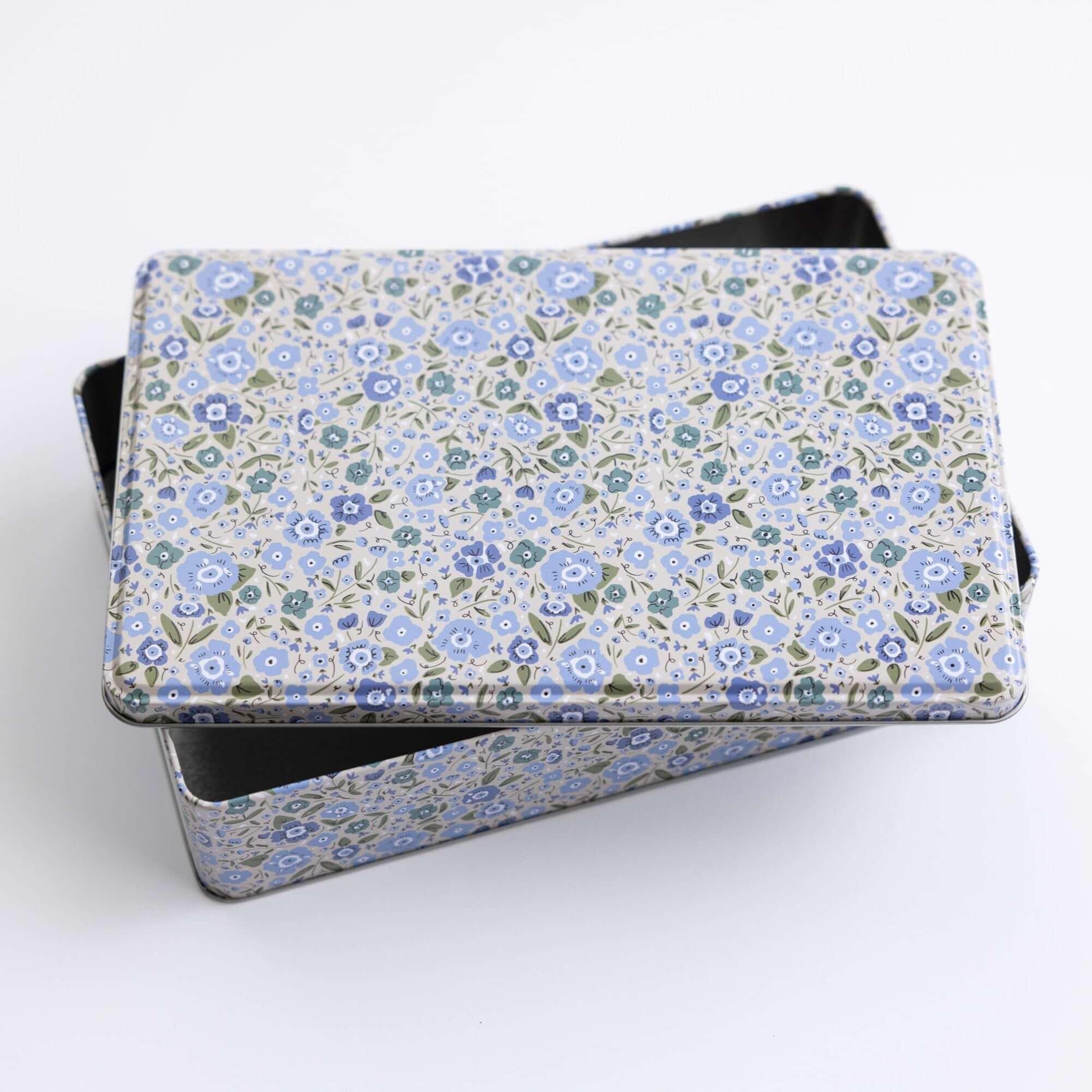 tea towel with illustrated bees and floral elements