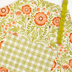Poppy Apron—bake in style with gingiber apron featuring floral poppy print, adjustable neck strap, large pocket, 100% cotton canvas