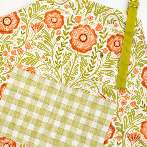 Poppy Apron—bake in style with gingiber apron featuring floral poppy print, adjustable neck strap, large pocket, 100% cotton canvas