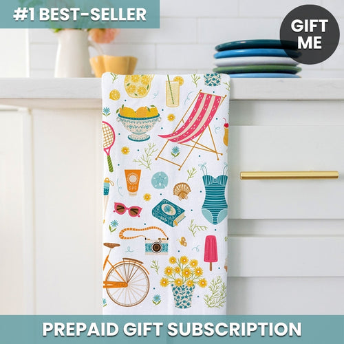 Colorful towel with summer-themed design hanging on a towel rack.