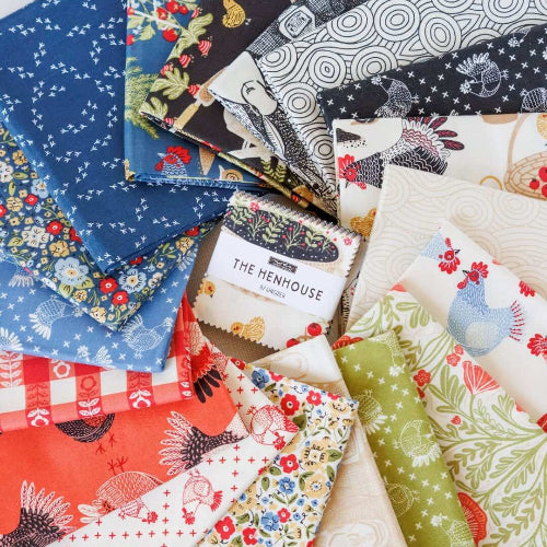 Collection of fabric swatches with various patterns and a brand label.