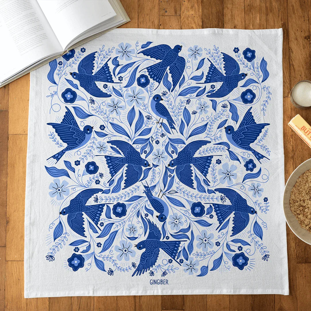 tea towel with blue songbird illustrations