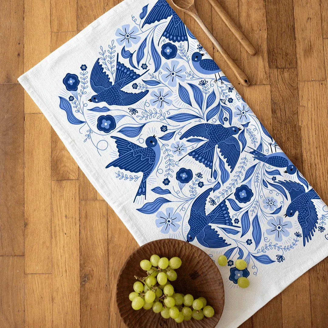 tea towels with bird and floral elements