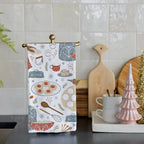 Sweet Traditions Tea Towel with holiday baking designs on flour sack cotton