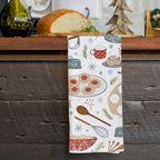 Sweet Traditions Tea Towel with holiday baking designs on flour sack cotton