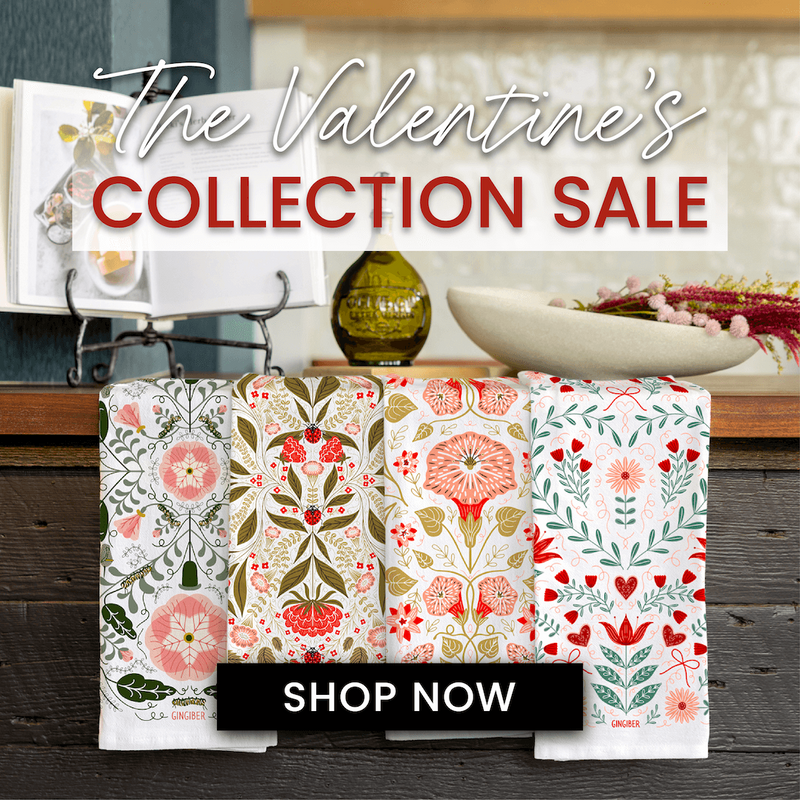 Valentine's Day-themed kitchen towels with floral patterns on a wooden surface, promotional text overlay.