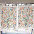 Floral patterned cafe curtain with pink flowers and green leaves on a white background.