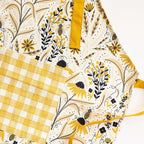 Bee Garden Apron—bake in style with gingiber apron featuring bee & floral print, adjustable neck strap, large pocket, 100% cotton canvas