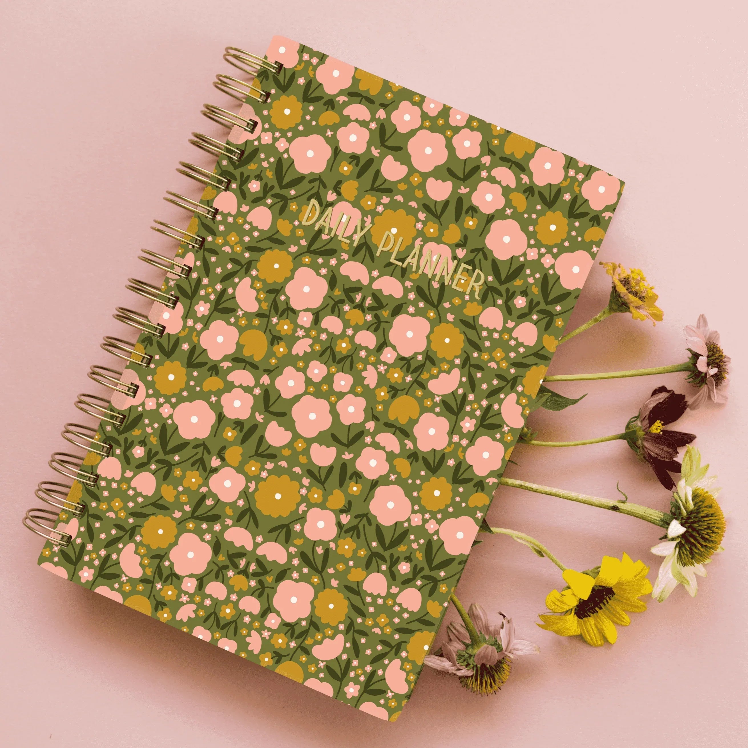 spiral bound daily planner with floral cover 