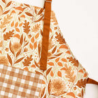 Mushroom Medley Apron—bake in style with gingiber apron featuring mushroom print, adjustable neck strap, large pocket, 100% cotton canvas